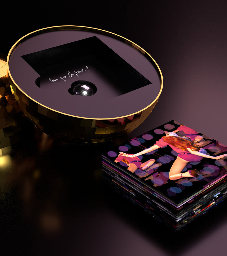 Madonna's "Confessions on a Dance Floor" box set disco ball container with CD card sleeve stack and USB