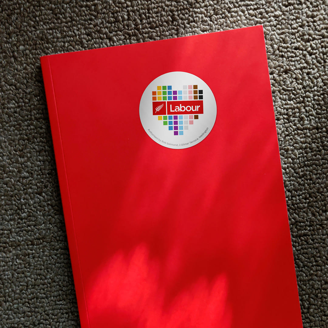 Labour Party stickers on a book cover.