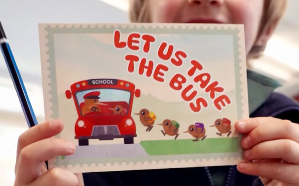 aThe New Zealand Labour Party's school bus campaign postcards, with watercolour illustrations of cute kiwis getting on a bus.