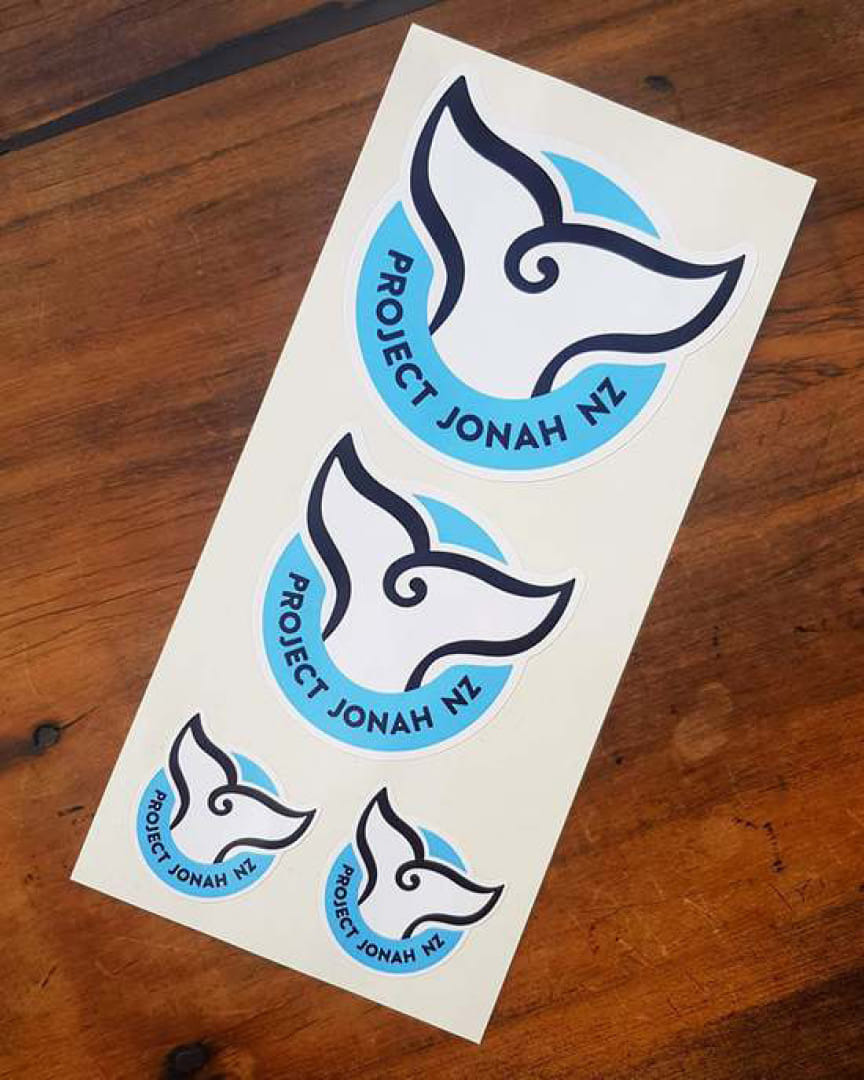 Project Jonah's new logo on t-shirts and stickers