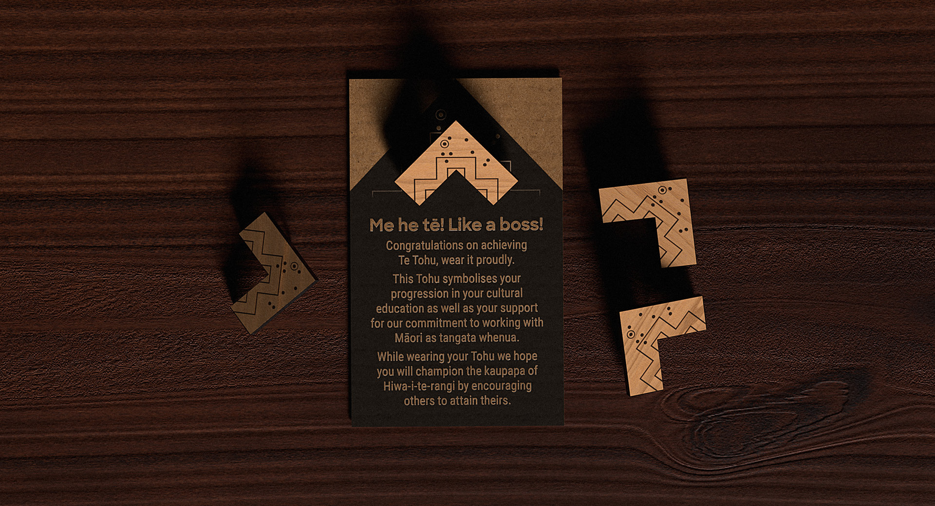 A top down angle of the final tohu, shown with the accompanying cards on a wooden table