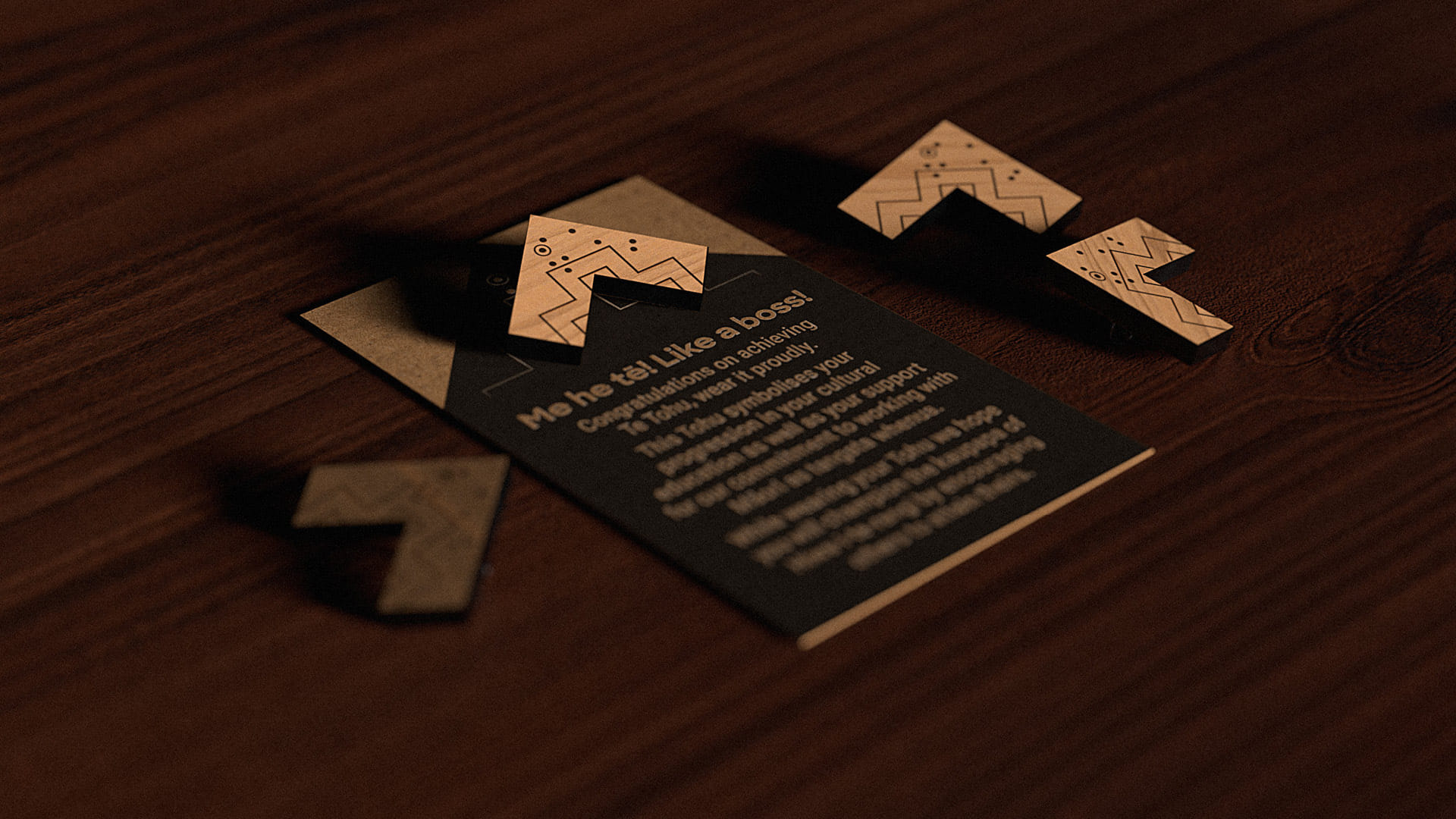An alternate angle of the final tohu, shown in a row of three with the accompanying cards on a wooden table