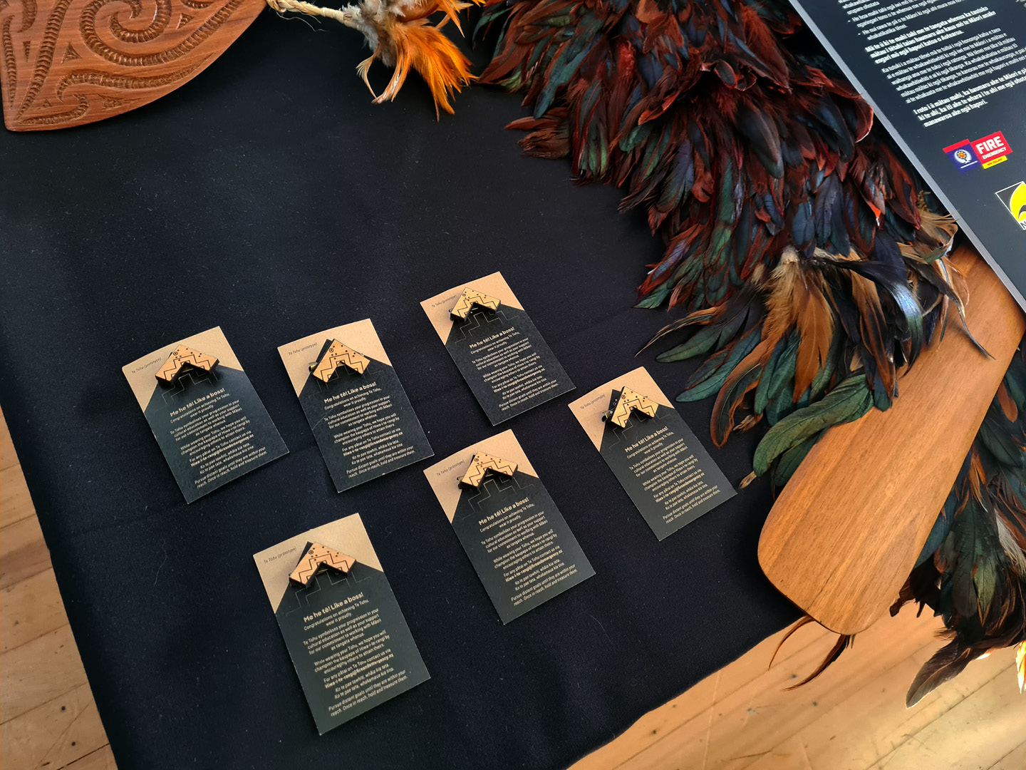 The final tohu, attached to their backing cards, on display at the first Fire and Emergency NZ Matariki event