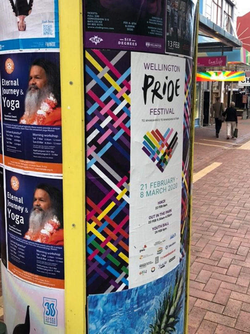Poster on Cuba Street for Wellington Pride Festival 2020