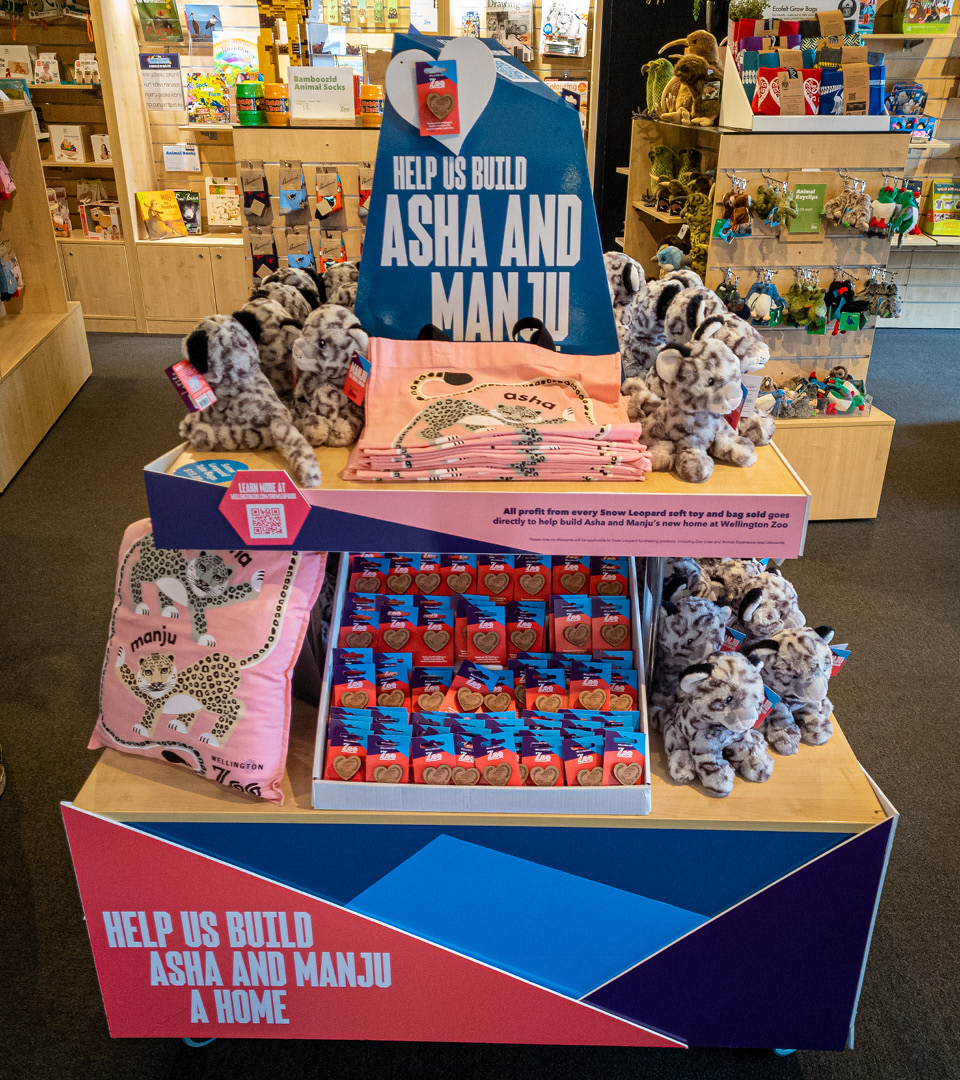 The snow leopard pins for Wellington Zoo, photographed on sale at the zoo shop, designed by Bradley Pratt